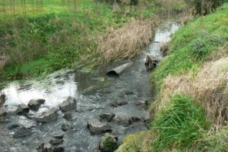 rubbish still in mid stream, and the clay bank is starting to cave in