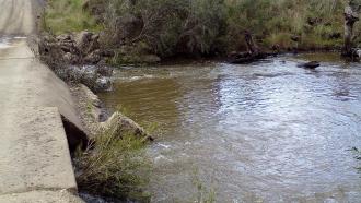 Looking across streamfrom east to west  on the downstream side of the ford
