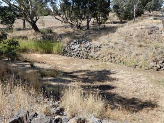 looking across stream. poolis at extreme left of photo