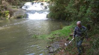 In training: Keith Craven learns water testing with Alan Hall