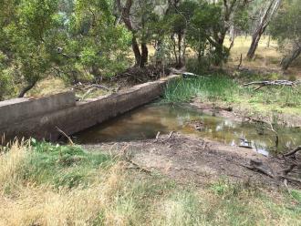 weir is leaking. Water level is now at level of leaking pipe