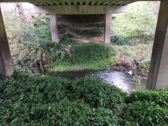 View looking east under bridge