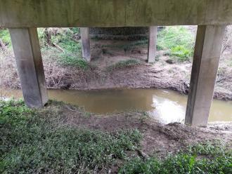 View looking east under bridge