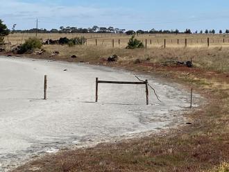The fence posts when the Lake is dry are a good reference point for when the Lake has water.