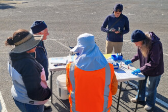Waterwatch team water testing at Clifton Springs boat harbour carpark.
