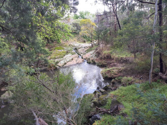 Round corner from downstream image. This is normal flow, but note bank erosion to right.