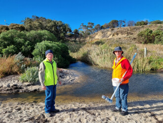 Water flow to bay blocked by sand bar.