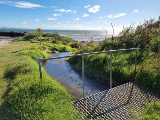 Water draining into the bay via overflow