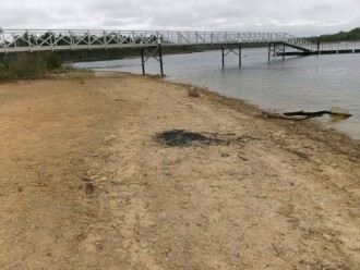 water level. camp fire ashes