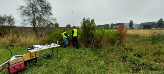 Viviana and Connor assessing site