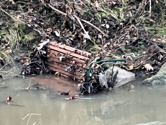Heavy rain the previous night washed a bench downstream